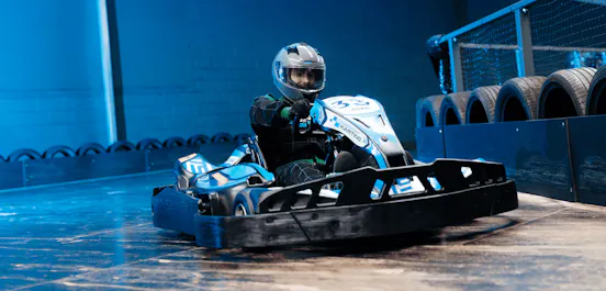 Male Karter On Electric Blue TeamSport Go Kart