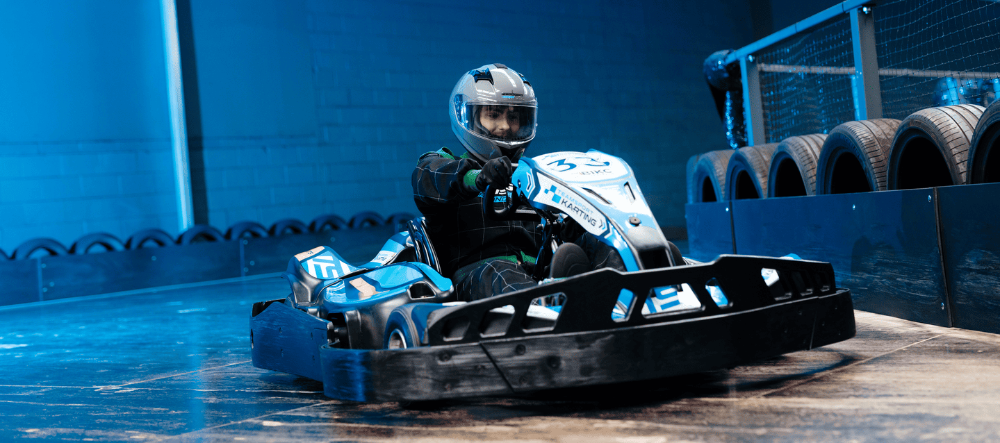Male Karter On Electric Blue TeamSport Go Kart