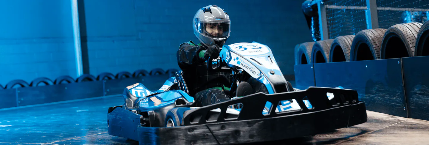 Male Karter On Electric Blue TeamSport Go Kart