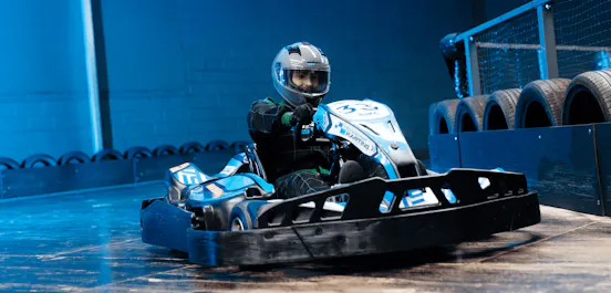 Male Karter On Electric Blue TeamSport Go Kart