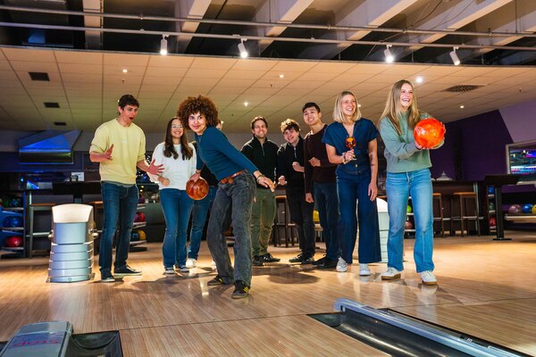 Group enjoying a casual game of ten‑pin bowling