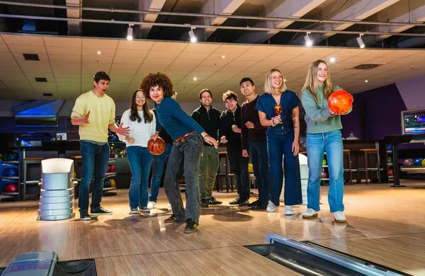 Group enjoying a casual game of ten‑pin bowling