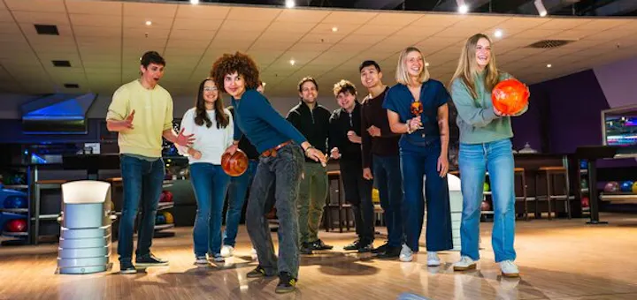 Group enjoying a casual game of ten‑pin bowling