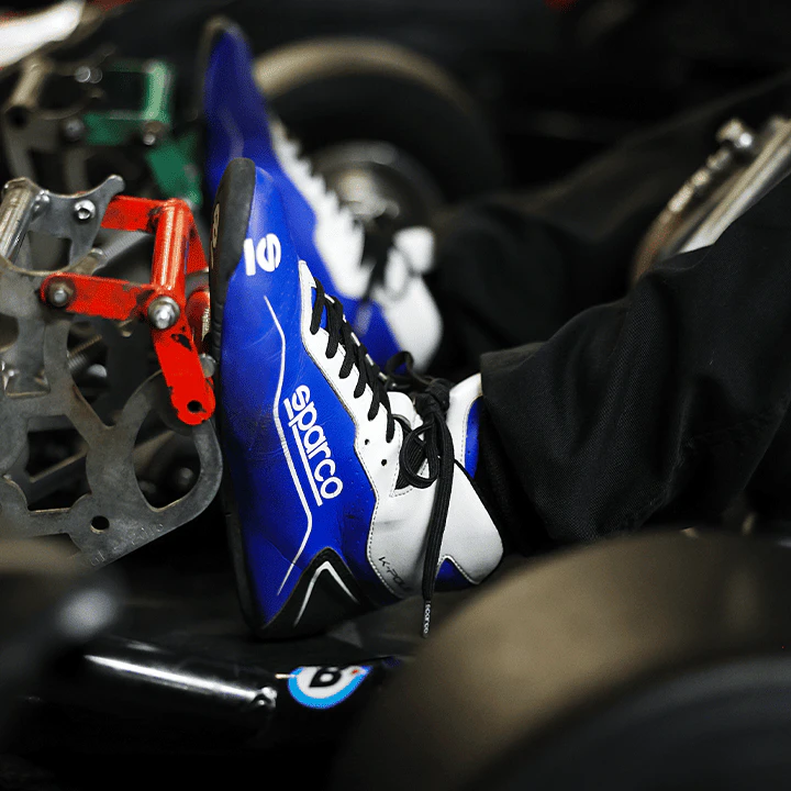TeamSport members racing on an indoor go-kart track