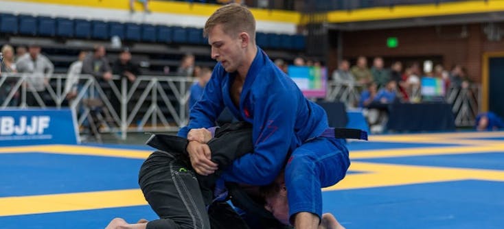 Tom gets his opponent in a kimura hold.