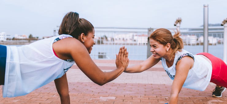 two girls exchanging a high-five