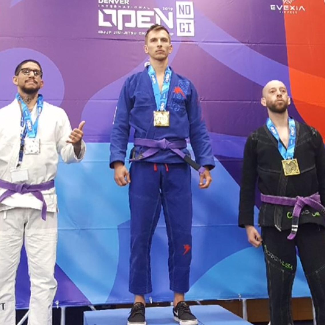 Tom winning first place in a Brazilian Jiu-Jitsu competition 