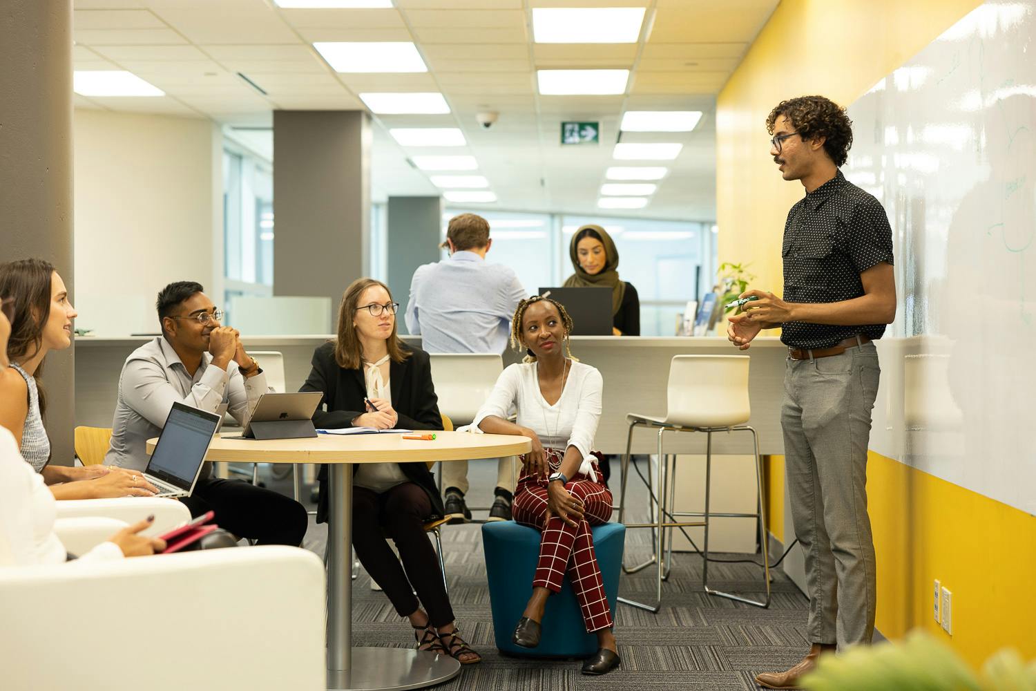 person presenting in the collaboration space in TechPlace