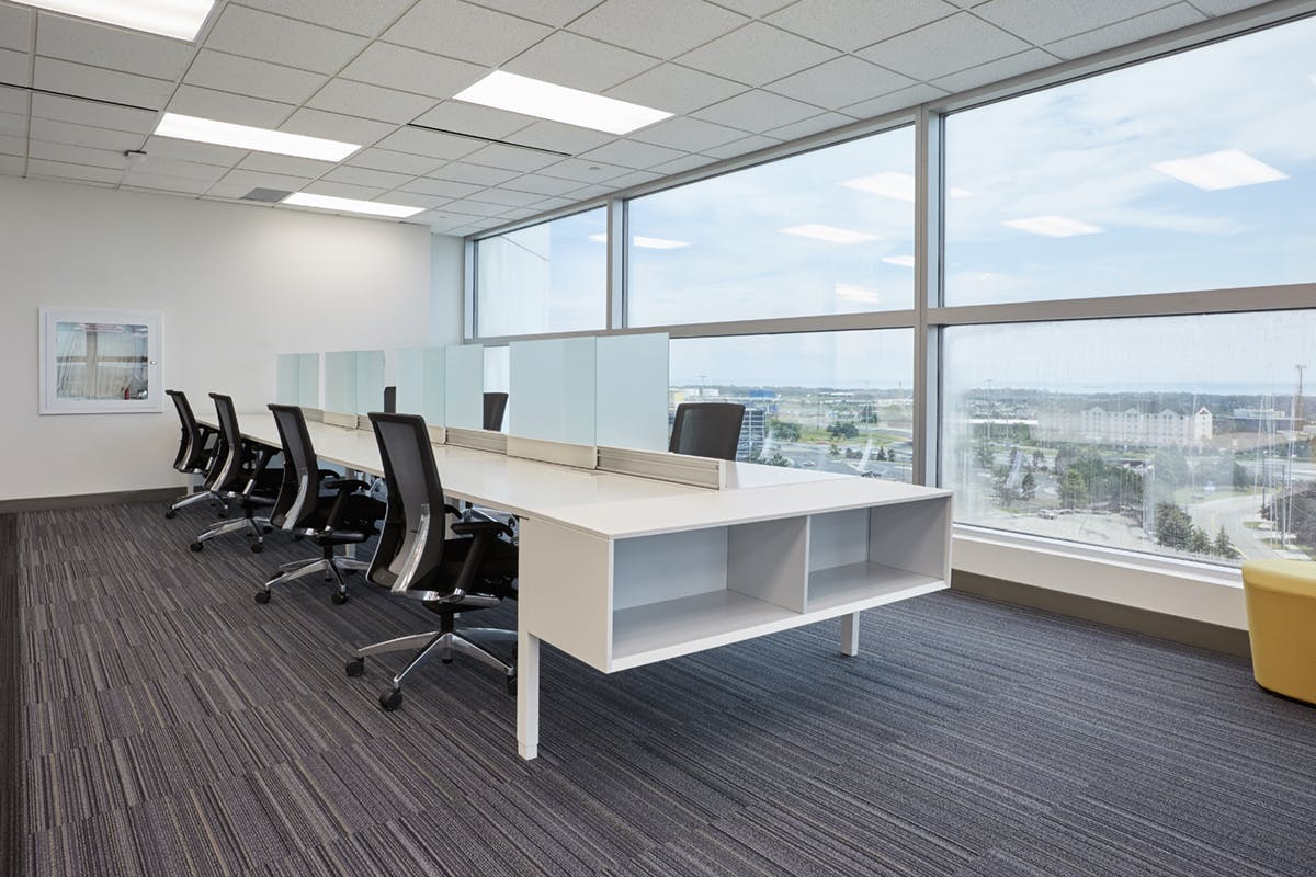 Dedicated hot desks on left side and the full window view on right side