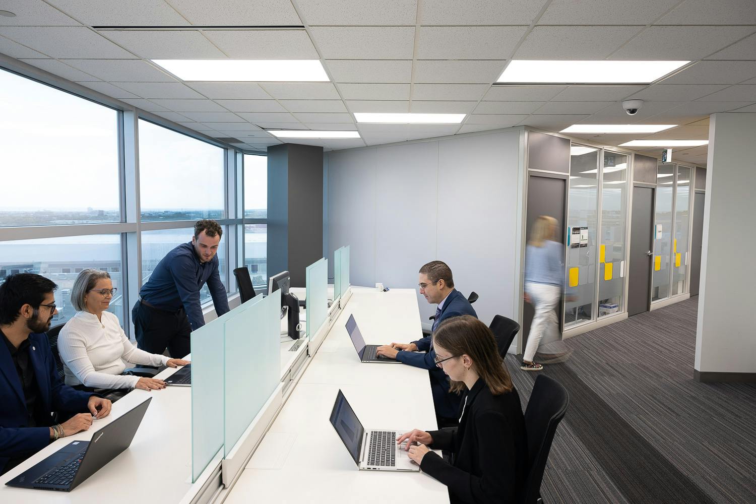 TechPlace members working together at hot desks