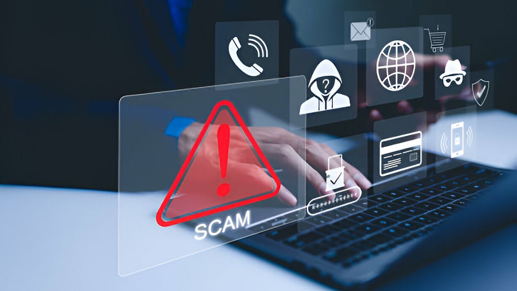 Scam Alert Warning with Cybersecurity Icons. A person using laptop, warning sign for scams with icons representing online threats, phishing, and cybersecurity. Unknown person, suspicious scammer, stock photo