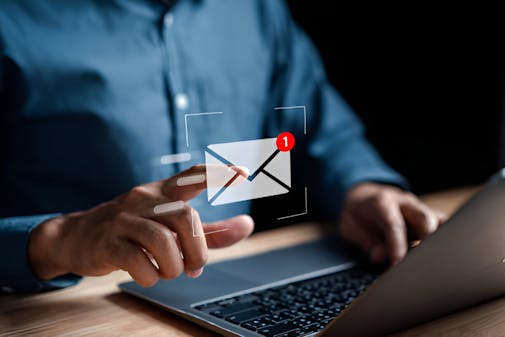 Businessman sending email by laptop computer to customer, business contact and communication, email icon, email marketing concept, send e-mail or newsletter, online working internet network. stock photo