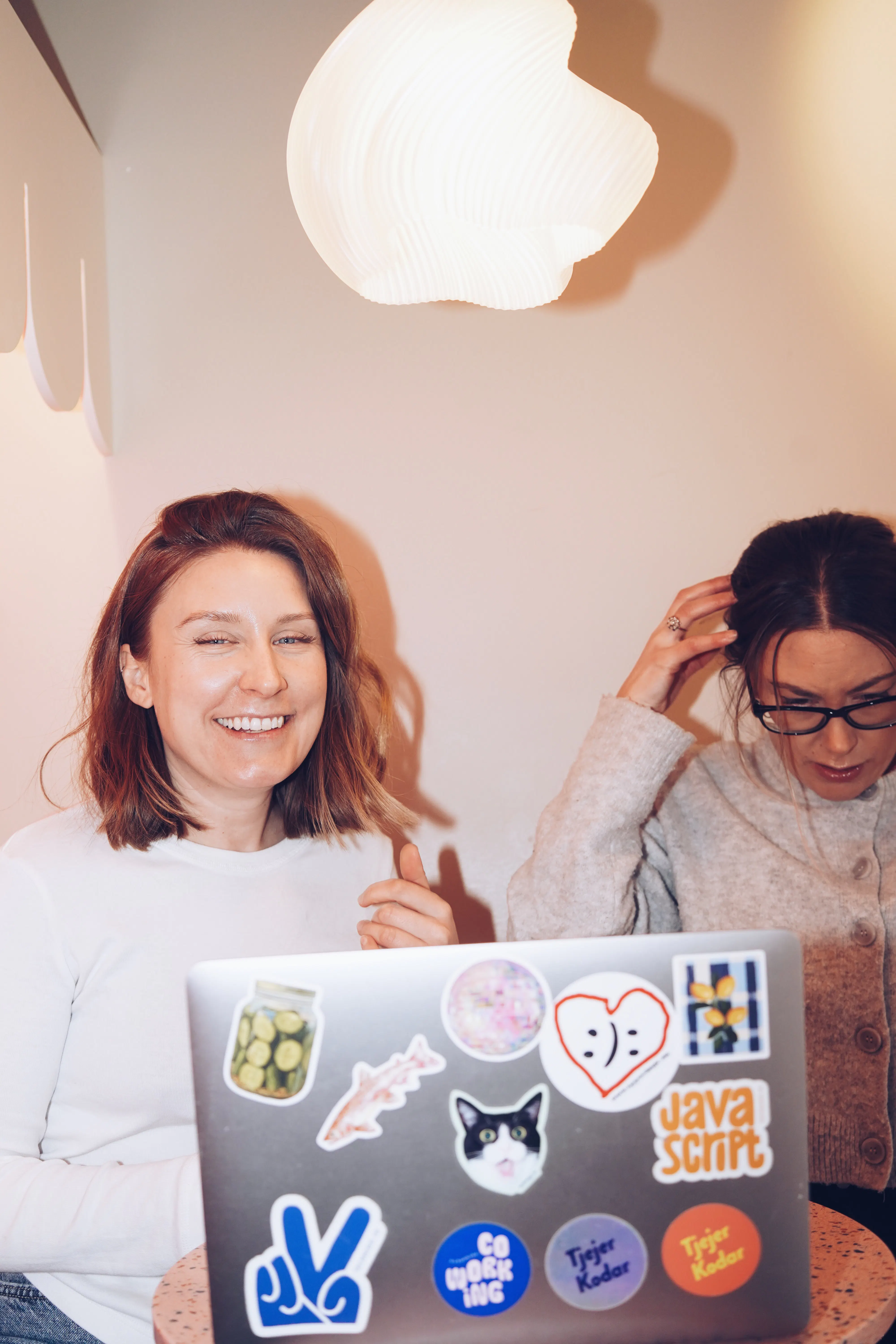 people laughing at computer
