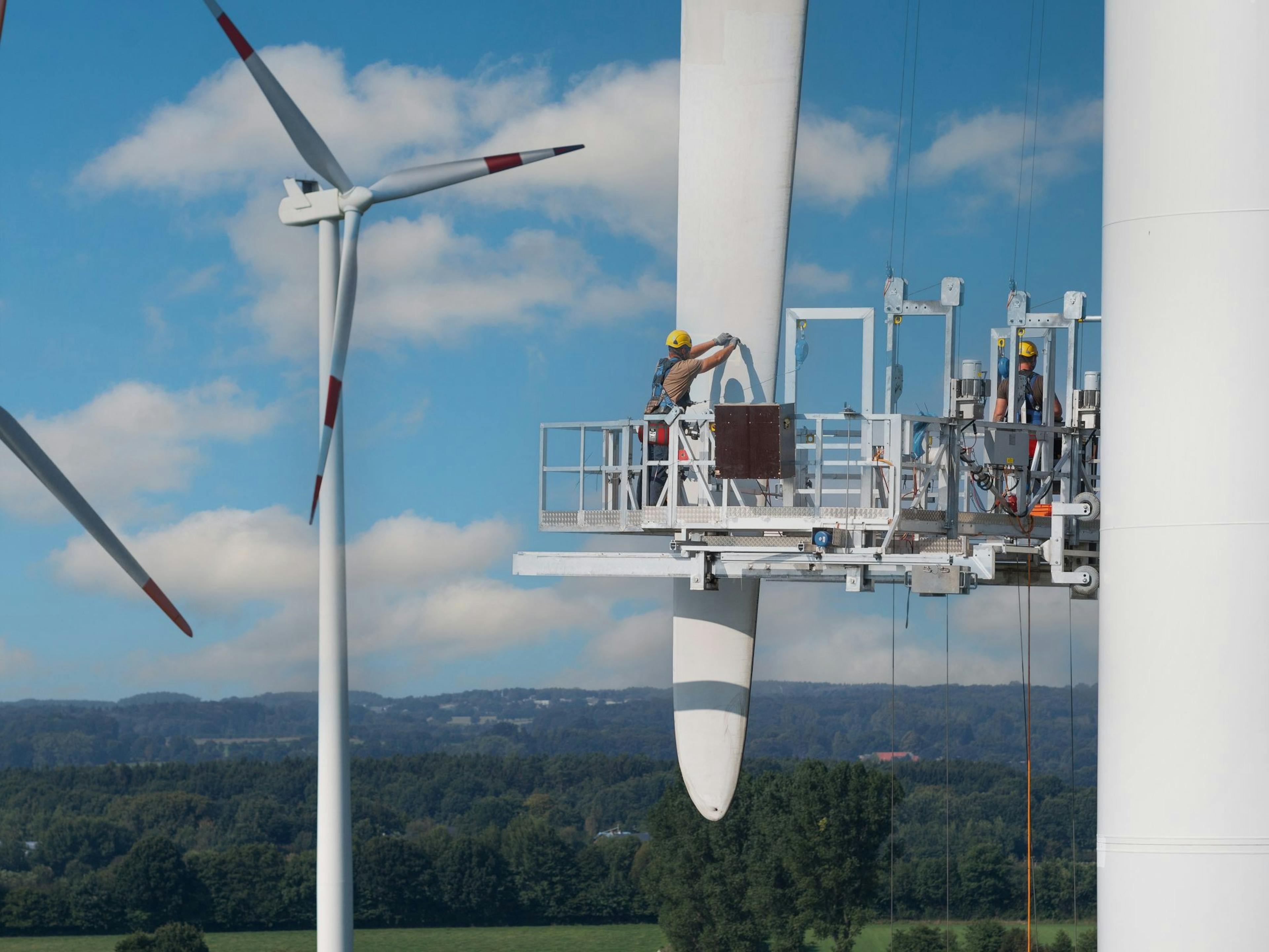 Man At The Top of a Windmill