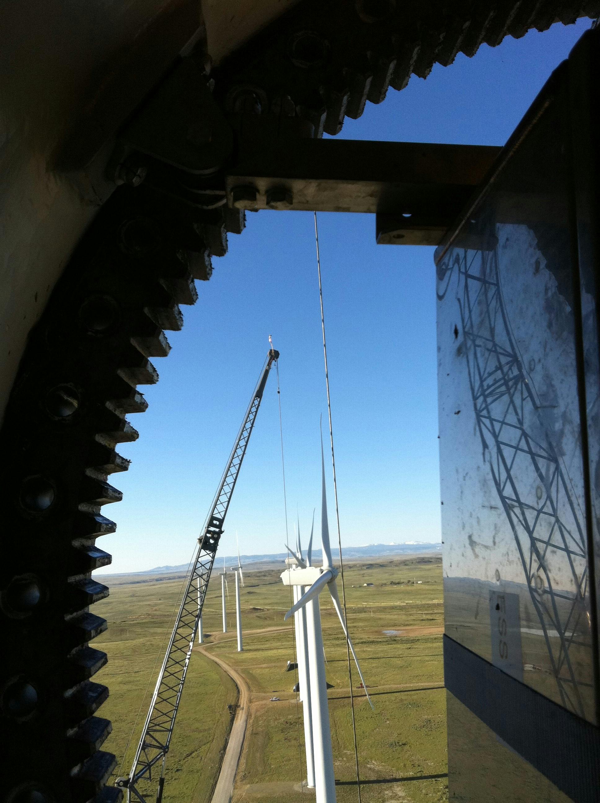 Portrait of a TSL Slinger Signaller next to a Windmill