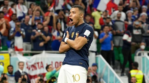Kylian Mbappe celebrating his goal against Poland in the 2022 Qatar World Cup
