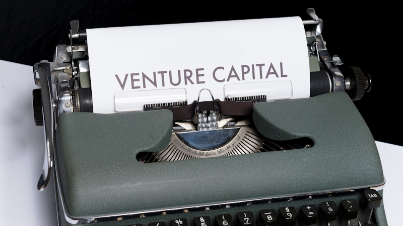 Manual typewriter with the words -Venture Capital.