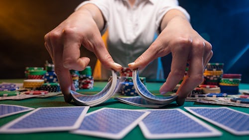 Image of a man playing card games at a casino