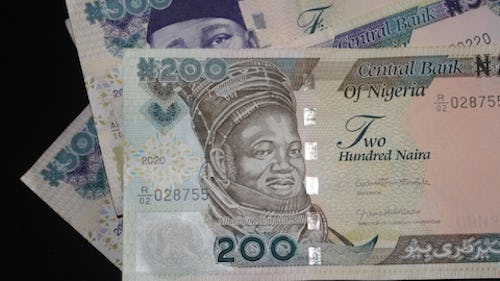 Loan apps in Nigeria: Naira notes in 200 NGN and 500 NGN denominations