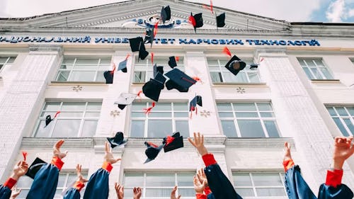 University graduands jubilating.