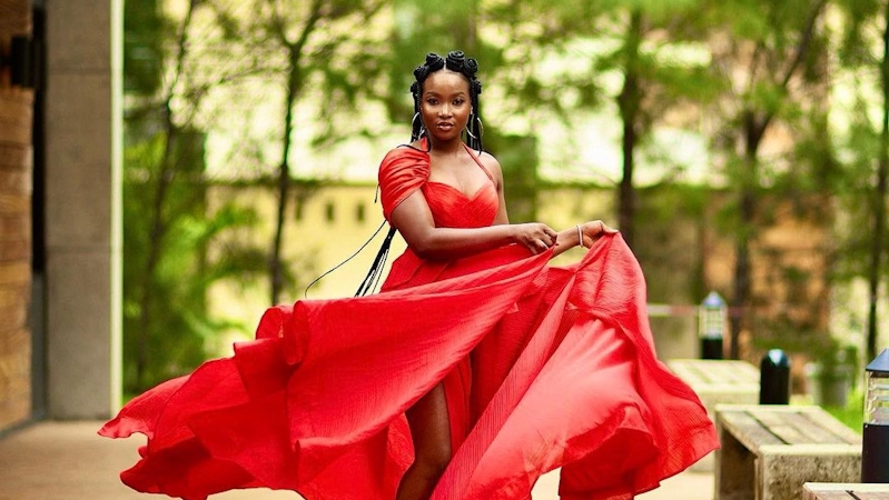 Ilebaye in a red dress