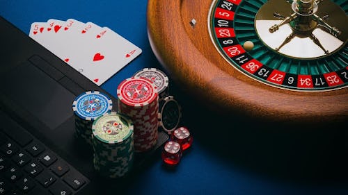 Image showing a casino table with card and slot games