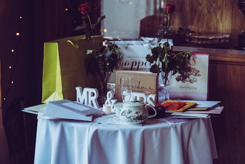 Image showing a decorated table with wedding items and gifts placed on it