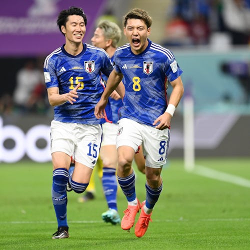 Japan celebrating their 2-1 victory against Germany