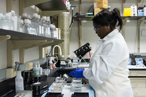 A Black laboratory scientist carrying out lab tests for diagnosis