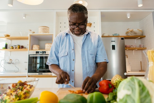 A black man preparing Nigerian meal