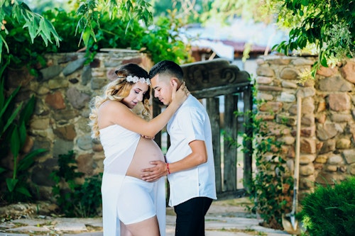 A man and his pregnant wife