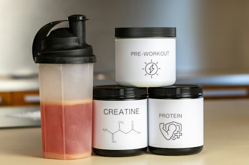 Image showing creatine and protein shake pre-workout supplements