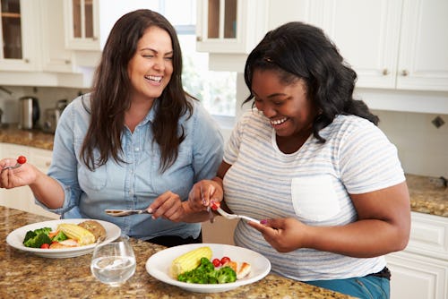 Two women eating healthy weight loss meals