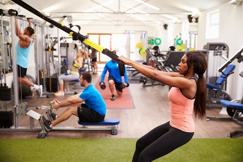 People doing resistance training at the gym