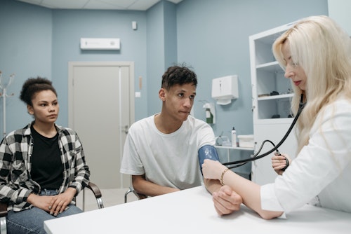 A couple consulting a doctor