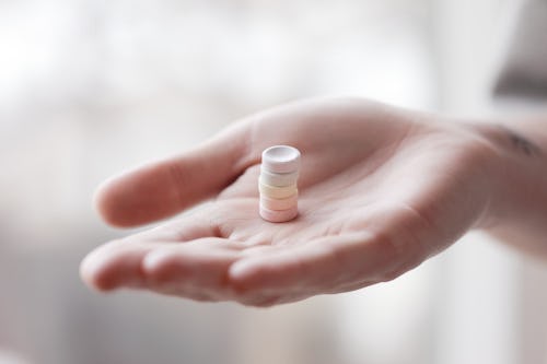 Picture of a person holding tablets