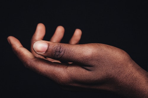 A hand with healthy fingernails