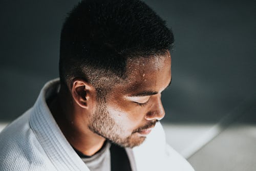 A man experiencing heat and sweating from the forehead