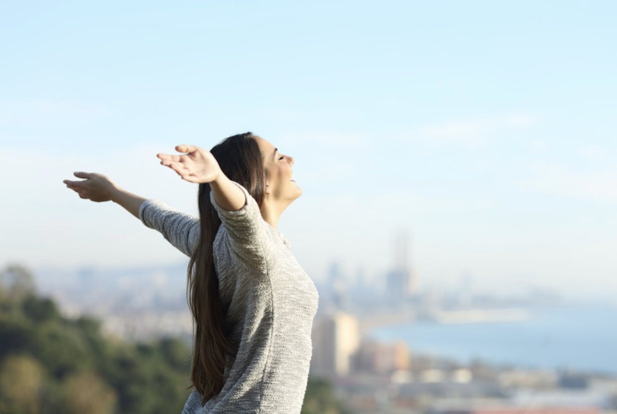 Girl in Barcelona spreading her hands