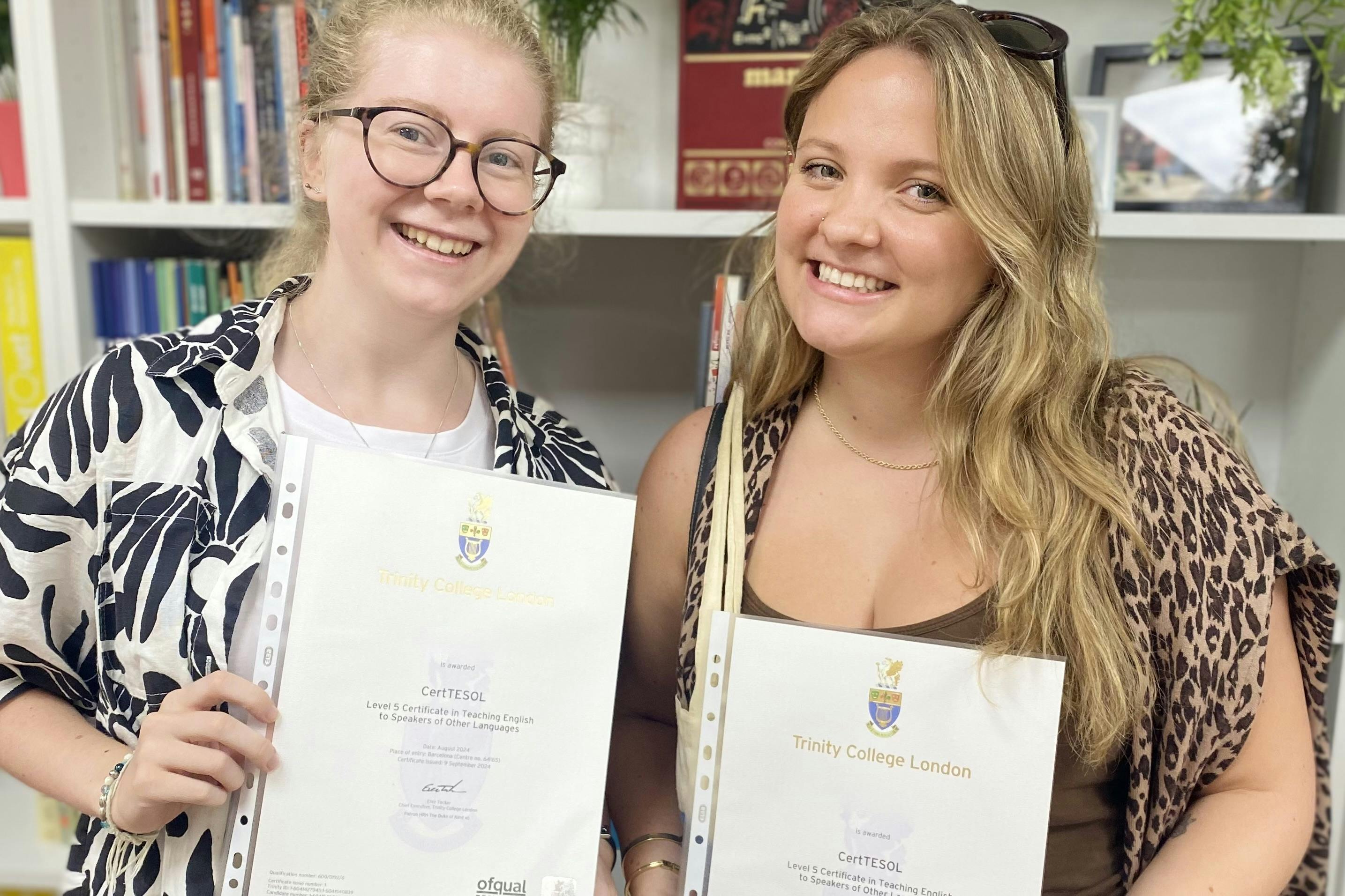 Students at TEFL Iberia holding their TEFL certificates