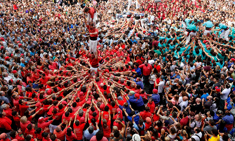 Castellers - joyous human towers - a local Catalan speciality