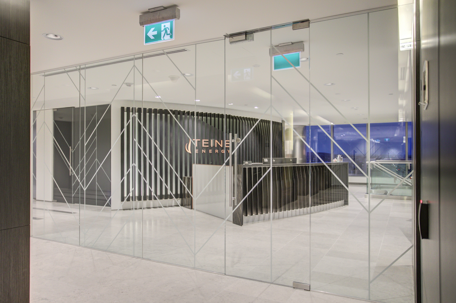 Office door exterior, looking into the front lobby.
