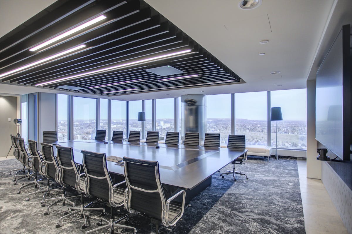 A downtown office interior, lit by ceiling fluorescents.