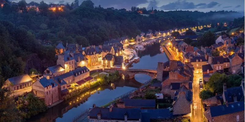 Twilight view of France nestled by a river