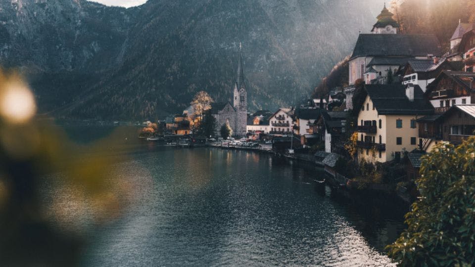 Austrian lakeside village at sunset.