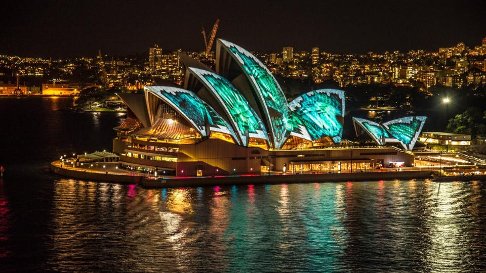 Sydney Opera House with lights.