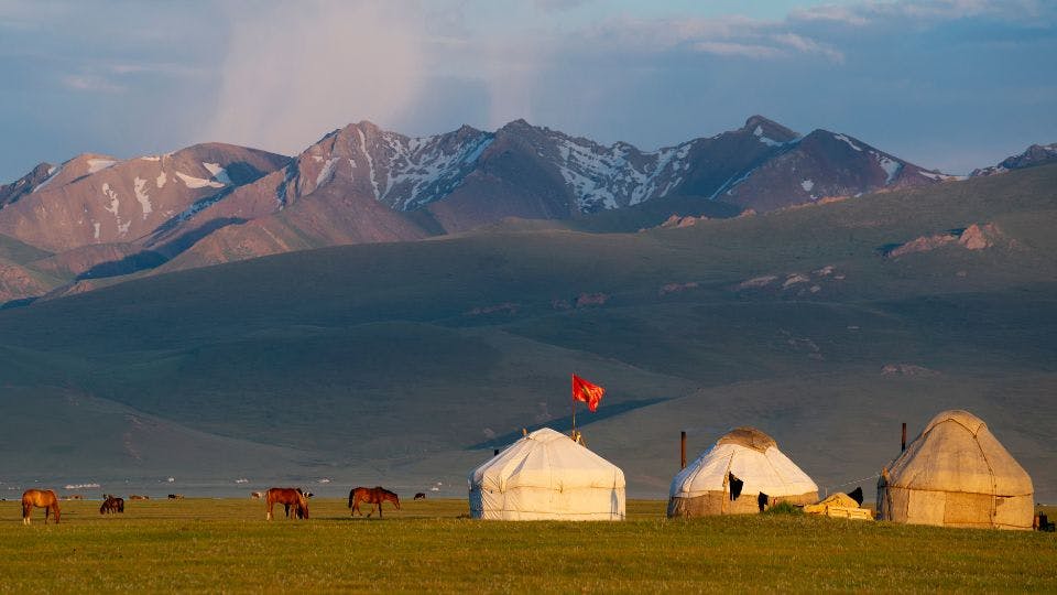 Yurts on mountain plains in Kyrgyzstan