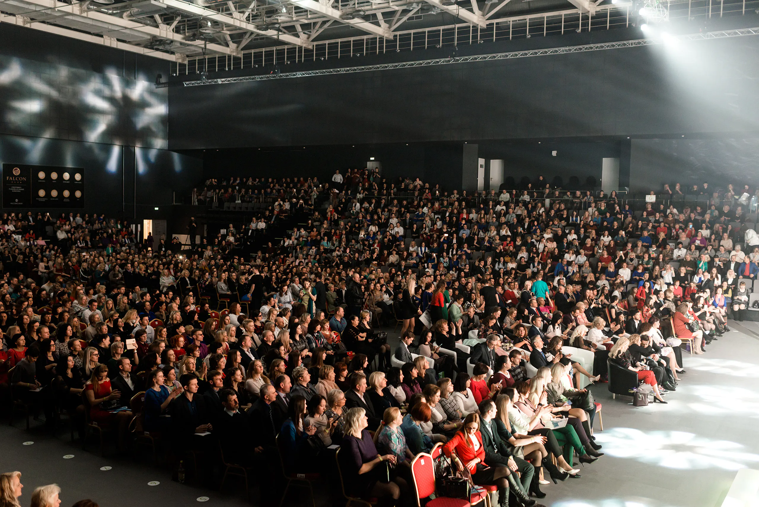Oriflame leaders and distributors filling the stalls and tiered seating of the arena during the summit