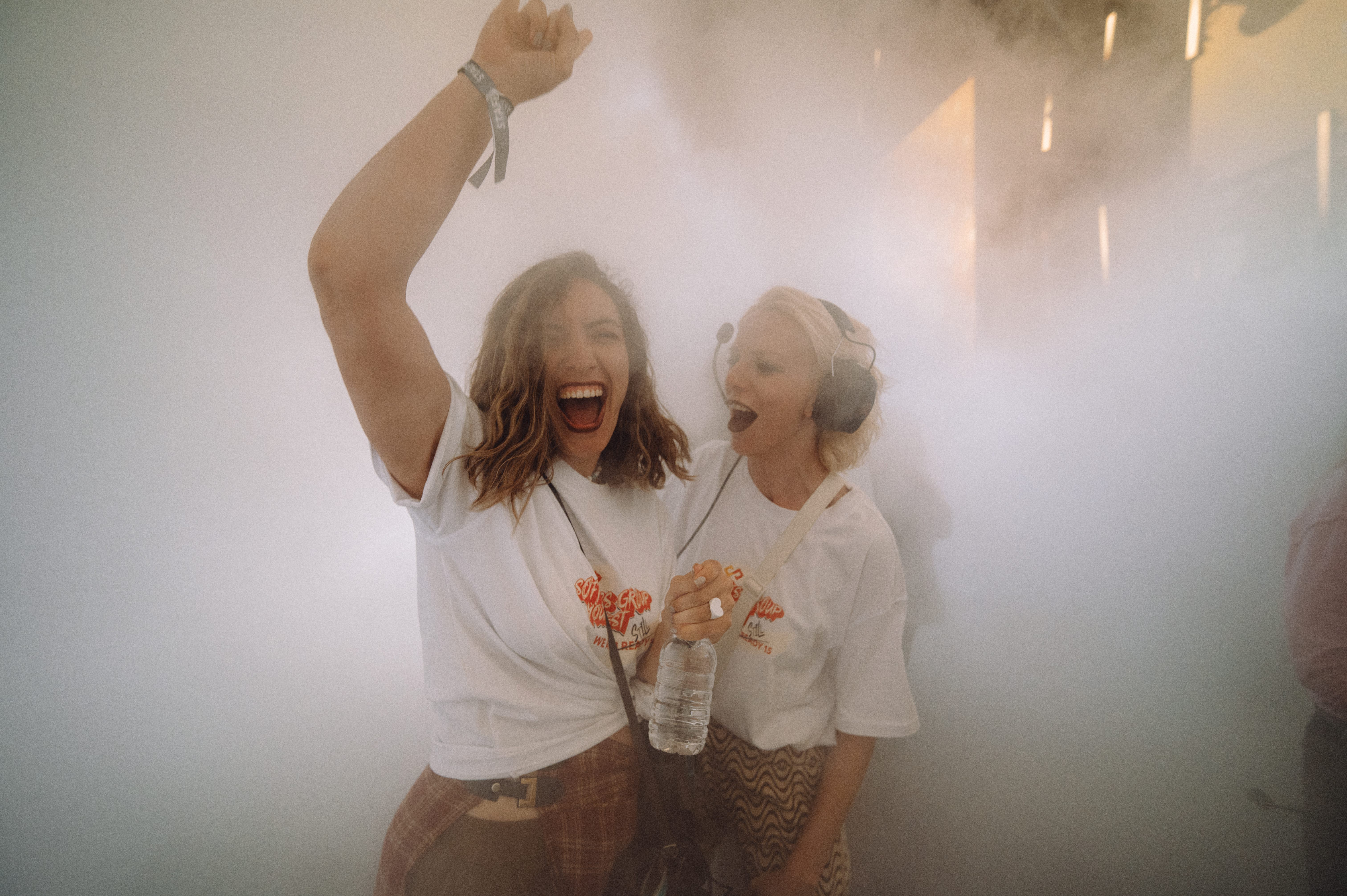 Two guests enjoying a high-energy event experience