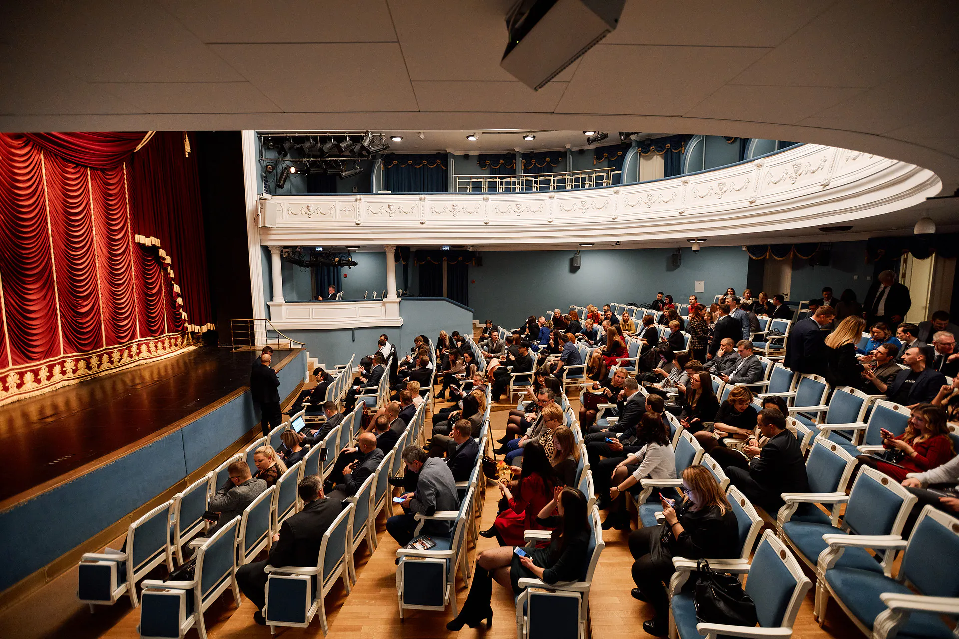 Masterday guests taking their seats in the theatre hall before the conference session